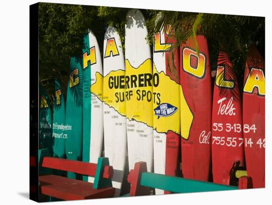 Mexico, Pacific Coast, Guerrero, Ixtapa, Catcha La Ola Surf Shop Sign-Walter Bibikow-Stretched Canvas