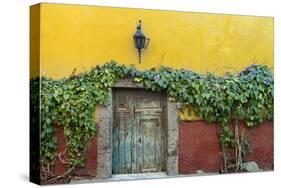 Mexico, San Miguel de Allende. Doorway to colorful building.-Don Paulson-Stretched Canvas