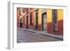 Mexico, San Miguel de Allende. Elderly man walks up sidewalk.-Don Paulson-Framed Photographic Print