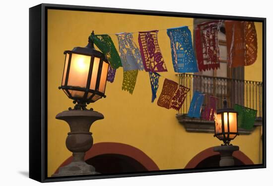 Mexico, San Miguel de Allende. Lantern with string of flags on them.-Jaynes Gallery-Framed Stretched Canvas