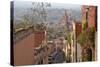 Mexico, San Miguel de Allende. Street scene with overview of city.-Don Paulson-Stretched Canvas