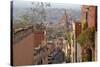 Mexico, San Miguel de Allende. Street scene with overview of city.-Don Paulson-Stretched Canvas