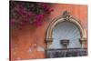 Mexico, Street Fountain Built into a Salmon Colored Wall with Fuschia Flowering Branch-Judith Zimmerman-Stretched Canvas