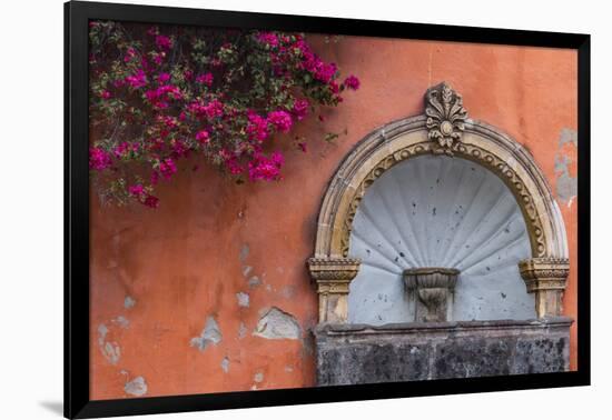 Mexico, Street Fountain Built into a Salmon Colored Wall with Fuschia Flowering Branch-Judith Zimmerman-Framed Photographic Print