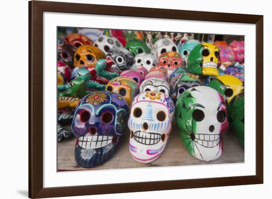 Mexico, Yucatan, Isla Mujeres, colorful ceramic calavera skulls for sale in market.-Merrill Images-Framed Photographic Print