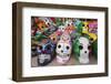 Mexico, Yucatan, Isla Mujeres, colorful ceramic calavera skulls for sale in market.-Merrill Images-Framed Photographic Print