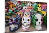 Mexico, Yucatan, Isla Mujeres, colorful ceramic calavera skulls for sale in market.-Merrill Images-Mounted Photographic Print