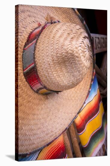Mexico, Yucatan, Isla Mujeres, straw hat and colorful blankets.-Merrill Images-Stretched Canvas