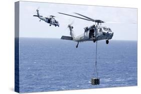 Mh-60S Sea Hawk Helicopters Conduct a Vertical Replenishment-null-Stretched Canvas