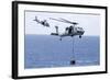 Mh-60S Sea Hawk Helicopters Conduct a Vertical Replenishment-null-Framed Photographic Print