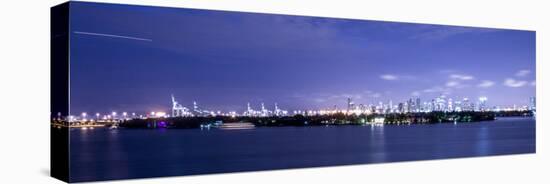 Miami, Florida: a Panoramic of Downtown and the Port of Miami Lit Up at Night-Brad Beck-Stretched Canvas