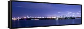 Miami, Florida: a Panoramic of Downtown and the Port of Miami Lit Up at Night-Brad Beck-Framed Stretched Canvas
