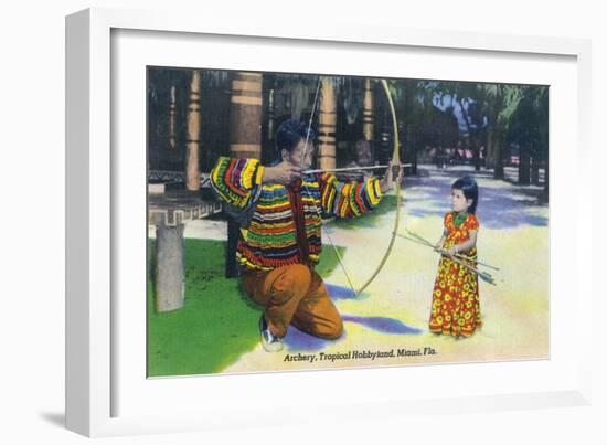 Miami, Florida - Tropical Hobbyland; Seminole Dad Showing Daughter Archery-Lantern Press-Framed Art Print