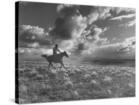 Michael Brennan on Ranch Horseback Riding-J^ R^ Eyerman-Stretched Canvas