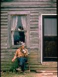 Country Musician, Fred Price, Sitting Outdoors in Front of Old House Playing the Fiddle-Michael Mauney-Photographic Print