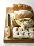 Assorted Loaves on Wooden Chopping Board-Michael Paul-Photographic Print