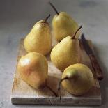 Five Yellow Pears on a Chopping Board-Michael Paul-Photographic Print