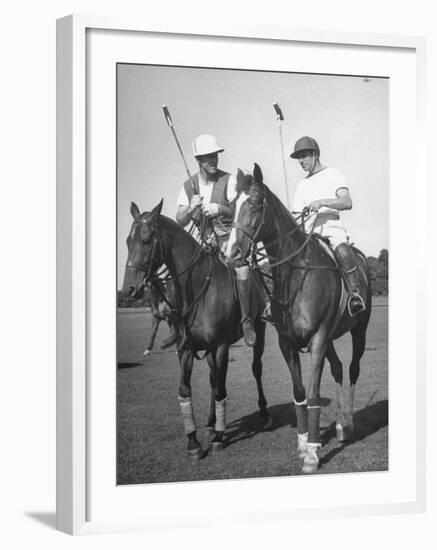 Michael Phipps Talking to a Fellow Polo Player-Nina Leen-Framed Premium Photographic Print