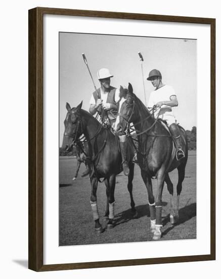 Michael Phipps Talking to a Fellow Polo Player-Nina Leen-Framed Premium Photographic Print