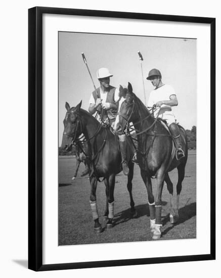 Michael Phipps Talking to a Fellow Polo Player-Nina Leen-Framed Premium Photographic Print