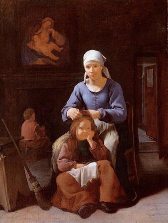 A Woman Grooming Her Child's Hair