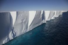 Iceberg reflected in still water of the Crystal Sound, Antarctic Peninsula, Antarctica-Michel Roggo-Photographic Print