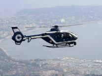 A Gendarme Helicopter is Seen Above the Bay of Cannes-Michel Spingler-Framed Stretched Canvas
