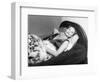 Michèle Morgan Laid on a Bed, 1951-Marcel Begoin-Framed Photographic Print