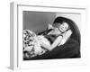 Michèle Morgan Laid on a Bed, 1951-Marcel Begoin-Framed Photographic Print