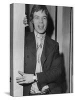 Mick Jagger in a Door-Associated Newspapers-Stretched Canvas