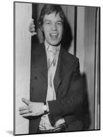 Mick Jagger in a Door-Associated Newspapers-Mounted Photo