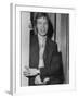 Mick Jagger in a Door-Associated Newspapers-Framed Photo