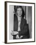 Mick Jagger in a Door-Associated Newspapers-Framed Photo