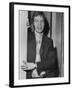 Mick Jagger in a Door-Associated Newspapers-Framed Photo