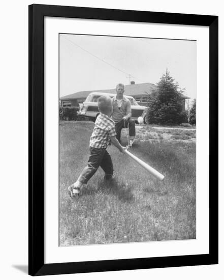 Mickey Mantle's Son Batting at Ball Pitched by Him-Ralph Morse-Framed Premium Photographic Print