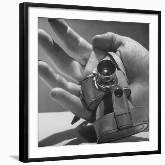 Micro Camera Resting in Palm of Hand-Andreas Feininger-Framed Photographic Print