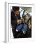 Mid Adult Man Strapping His Son into a Car-null-Framed Photographic Print