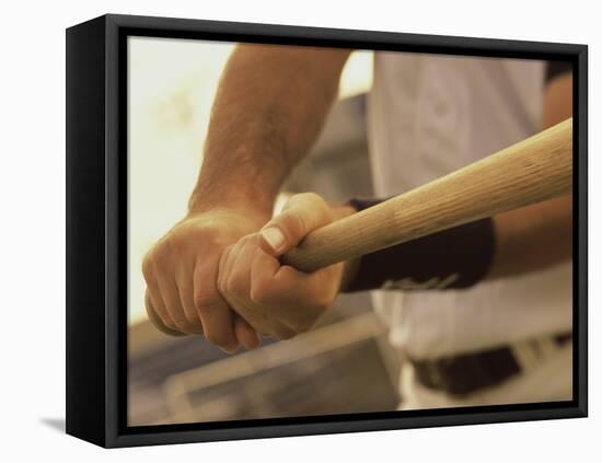 Mid Section View of a Baseball Player Swinging a Baseball Bat-null-Framed Stretched Canvas
