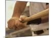 Mid Section View of a Baseball Player Swinging a Baseball Bat-null-Mounted Photographic Print