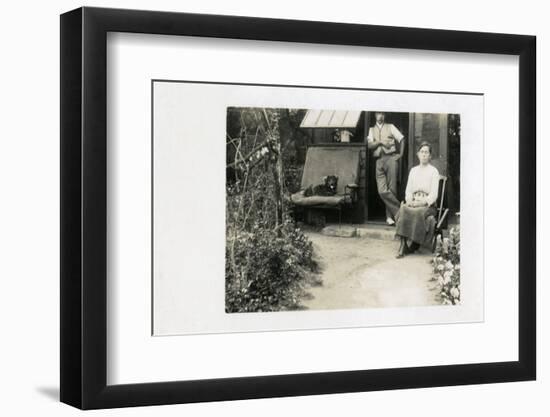 Middle Aged Couple in Back Yard with Dog-null-Framed Photographic Print