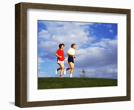 Middle-Aged Couple Jogging Together-Bill Bachmann-Framed Photographic Print