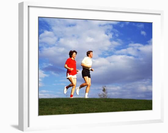 Middle-Aged Couple Jogging Together-Bill Bachmann-Framed Photographic Print