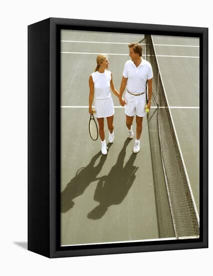 Middle-Aged Couple Relaxing after Tennis Match-Bill Bachmann-Framed Stretched Canvas