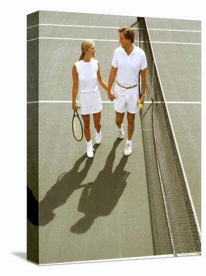 Middle-Aged Couple Relaxing after Tennis Match-Bill Bachmann-Stretched Canvas