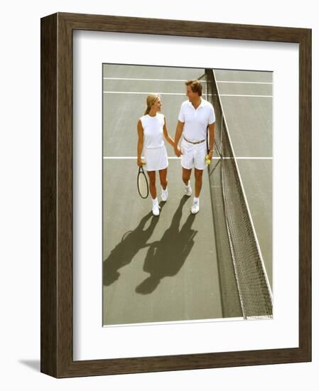 Middle-Aged Couple Relaxing after Tennis Match-Bill Bachmann-Framed Photographic Print