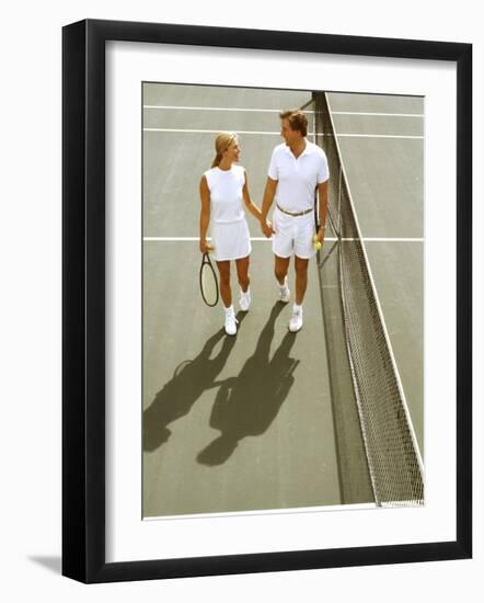 Middle-Aged Couple Relaxing after Tennis Match-Bill Bachmann-Framed Photographic Print