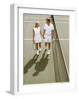 Middle-Aged Couple Relaxing after Tennis Match-Bill Bachmann-Framed Photographic Print