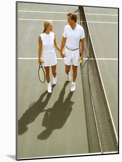 Middle-Aged Couple Relaxing after Tennis Match-Bill Bachmann-Mounted Photographic Print