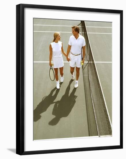 Middle-Aged Couple Relaxing after Tennis Match-Bill Bachmann-Framed Photographic Print