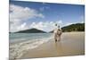 Middle Aged Couple Walking on Lambert Beach, Tortola, British Virgin Islands-Macduff Everton-Mounted Photographic Print